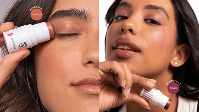 Bastão três em um sendo aplicado como blush, sombra e batom